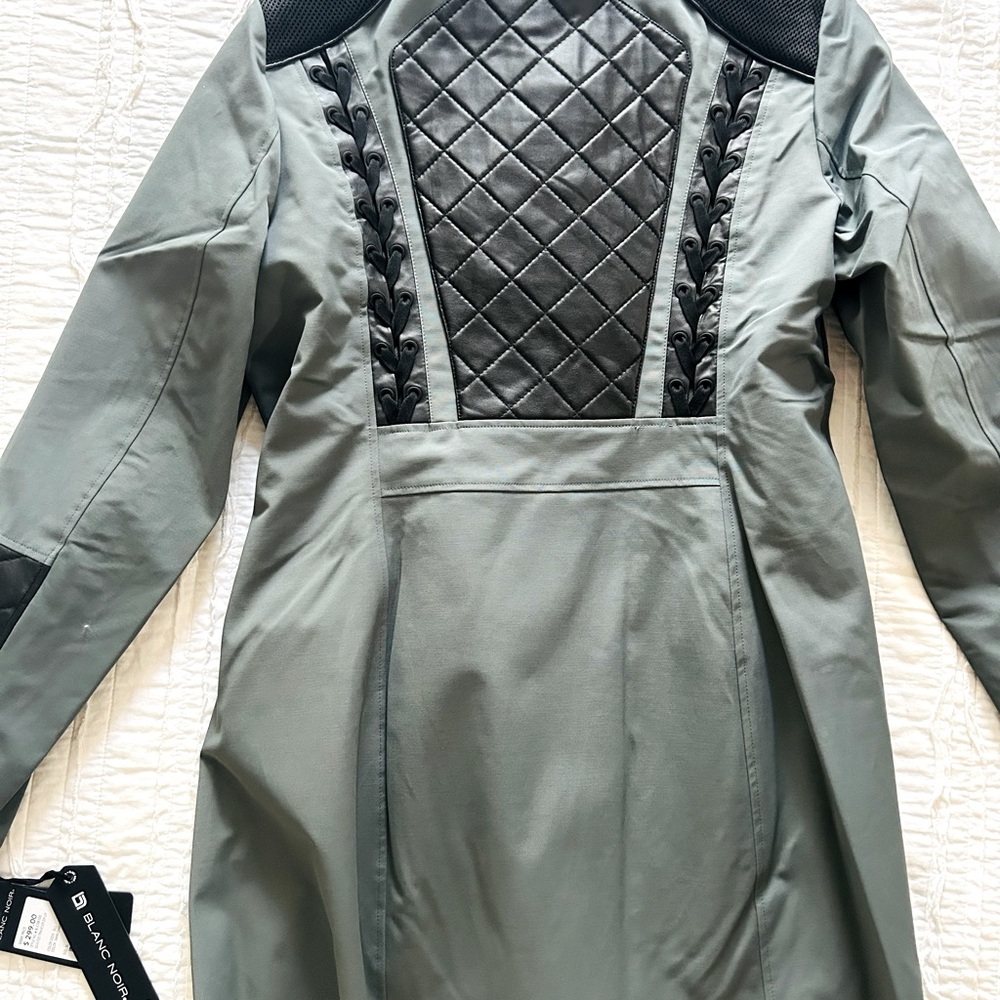 Blanc Noir Traveler, braided back, Jacket. Quilted black back, soft sage green.